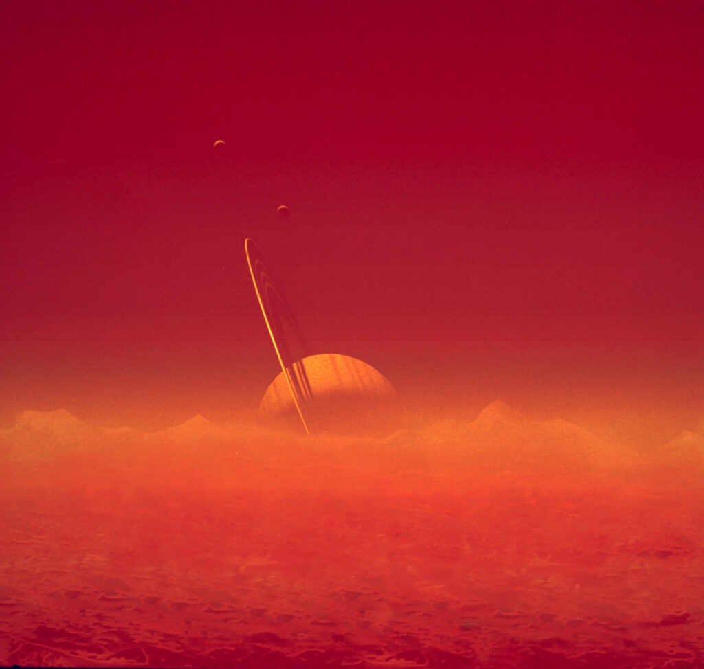 https://dev.universemagazine.com/wp-content/uploads/2022/02/saturn_viewed_through_titan_s_hazy_atmosphere.jpg