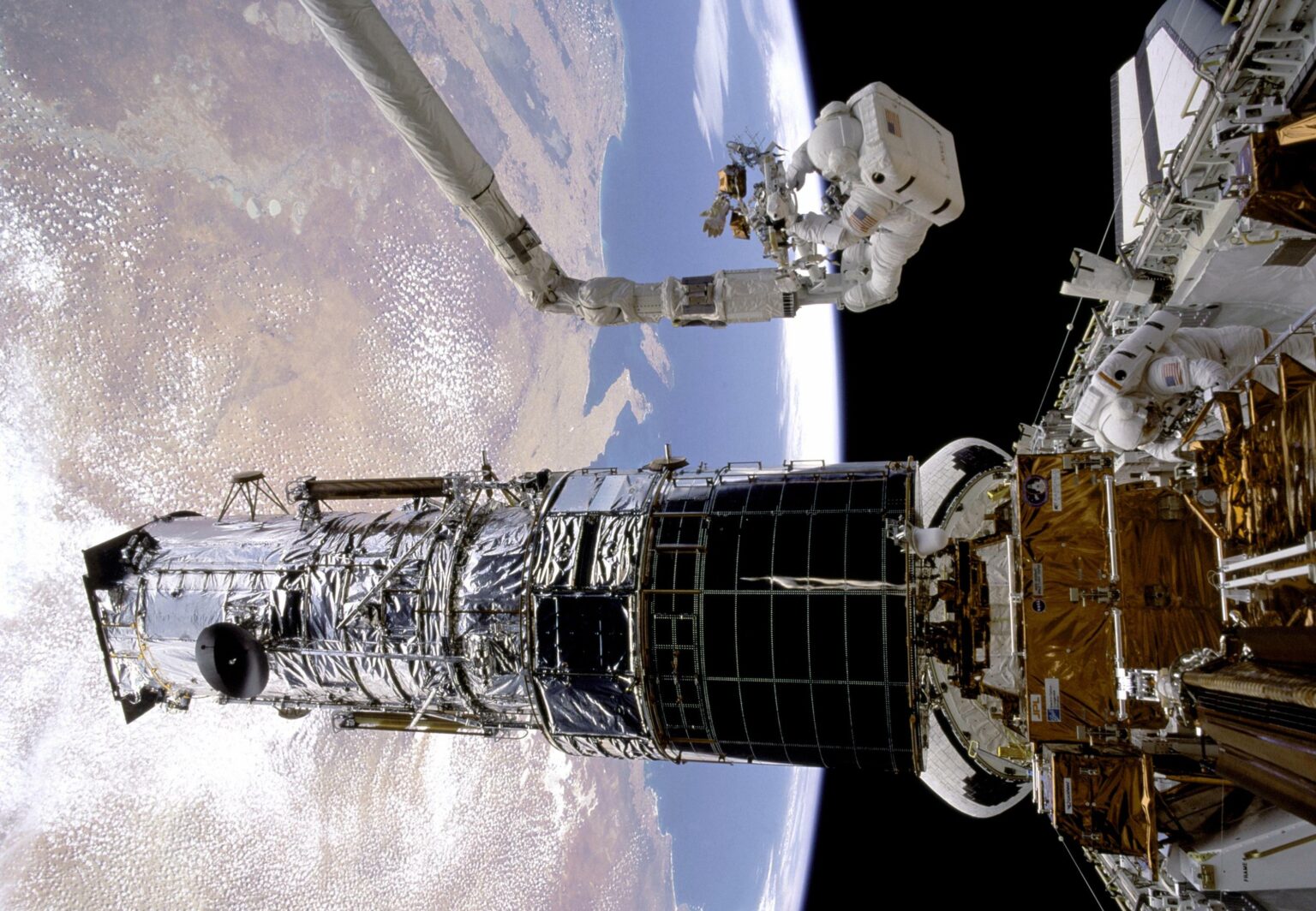 https://dev.universemagazine.com/wp-content/uploads/2022/09/sts61inspace_crop.jpg