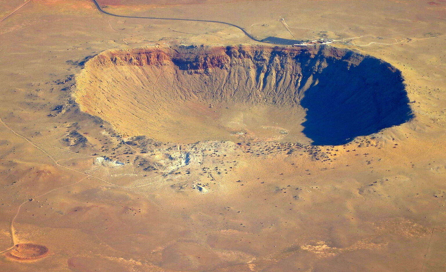 https://dev.universemagazine.com/wp-content/uploads/2023/10/meteor_crater_crop-a.jpg