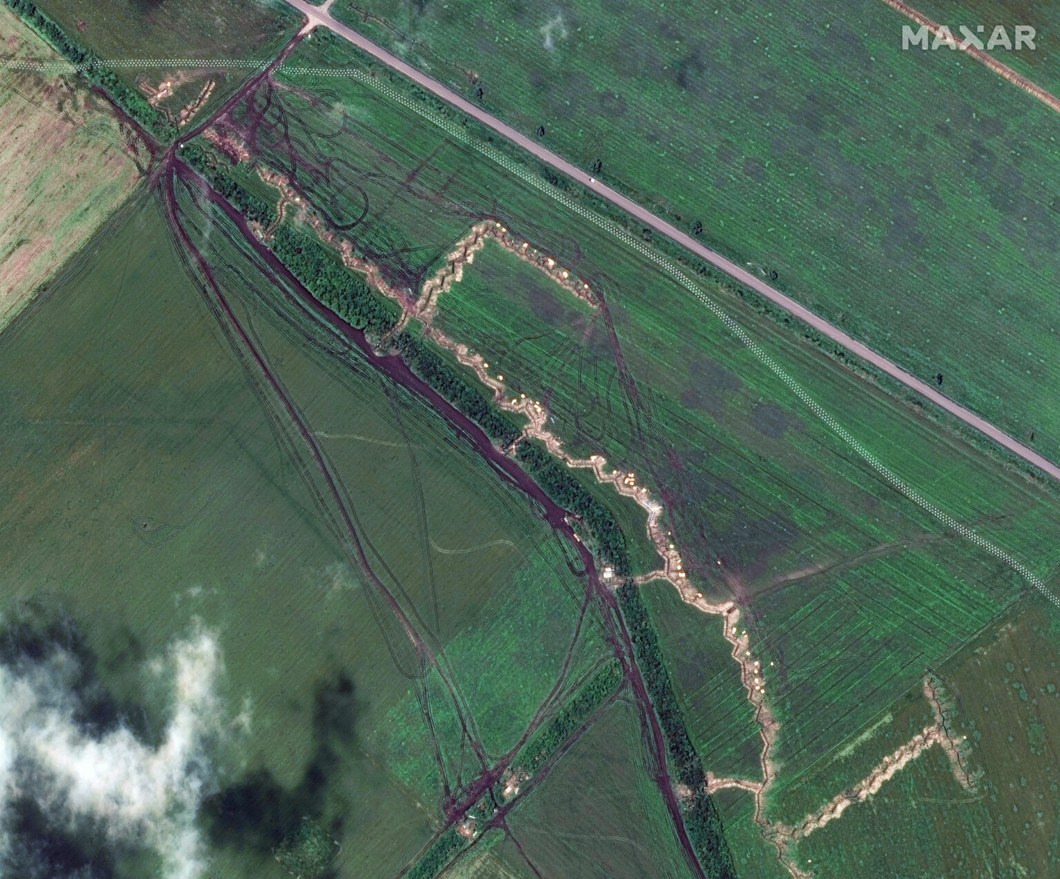 https://dev.universemagazine.com/wp-content/uploads/2023/12/10_trenches-and-dragons-teeth_shyroke-zaporizhzhia_01jun2023_wv03-2000x1657-1.jpg