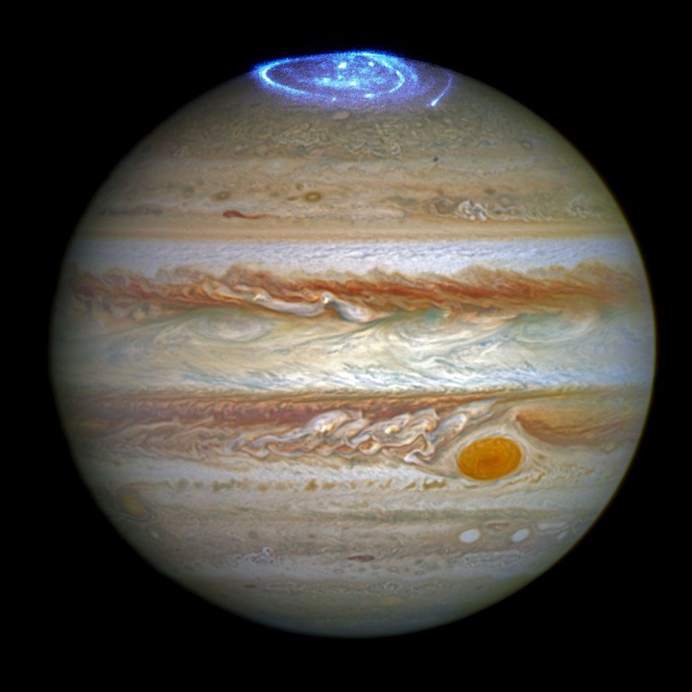 Яскраві полярні сяйва в атмосфері Юпітера, зафіксовані телескопом Hubble